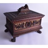 A FINE LARGE 19TH CENTURY ITALIAN CARVED WALNUT CASKET decorated with stylised birds and extensive