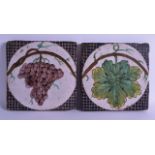 A PAIR OF 19TH CENTURY FRENCH VINEYARD TILES. 20.5 cm square.