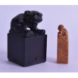 A 19TH CENTURY CHINESE CARVED BLACK STONE SEAL with buddhistic lion terminal, together with a