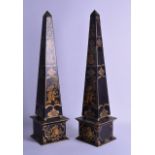 A PAIR OF GEORGE III STYLE LACQUERED CHINOSERIE OBELISKS decorated with figures in landscapes. 54 cm