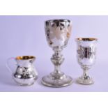 A GROUP OF THREE VICTORIAN MERCURY GLASS ARTICLES including a goblet, jug & smaller goblet.