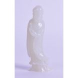 AN EARLY 20TH CENTURY CHINESE CARVED WHITE JADE FIGURE OF AN IMMORTAL modelled standing in flowing