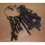 A BUNCH OF EARLY IRON KEYS some 17th century. (qty)