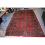 A LARGE FINELY KNOTTED BOKHARA CARPET. 295 cm x 191 cm.