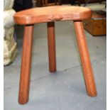 A ROBERT THOMAS MOUSEMAN TRIPOD ARTIST STYLE STOOL.