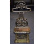 A VICTORIAN CAST IRON STICK STAND with boot scraper. 72 cm high. (2)