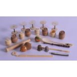 A COLLECTION OF ANTIQUE CARVED BONE THIMBLE CASES together with mother of pearl sewing utensils etc.