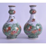 A PAIR OF 19TH CENTURY FRENCH SAMSONS OF PARIS WUCAI BULBOUS VASES in the Chinese Style, painted