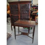 A GEORGE III STYLE OCCASIONAL TABLE together with an antique display cabinet. (2)