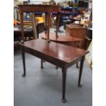 A LARGE ANTIQUE MAHOGANY DINING TABLE purchased from Hackwood House, with two spare leaves.