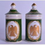 A PAIR OF LATE 19TH CENTURY FRENCH PORCELAIN APOTHECARY JARS AND COVERS gilded with eagles within