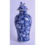 A 19TH CENTURY CHINESE BLUE AND WHITE BALUSTER JAR AND COVER bearing Kangxi marks to base, painted