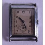 A 1930S CHROME WATCH DIAL with movement, in the manner of Jaeger Le Coultre. 3.25 cm wide.