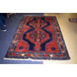 AN UNUSUAL EASTERN TRIBAL STYLE CARPET decorated with motifs. 240 cm x 160 cm.