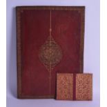 A GOOD 19TH CENTURY MOROCCAN LEATHER BOOK COVER with finely tooled gilt motifs. 27.5 cm x 37.5 cm.