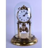 AN EARLY 20TH CENTURY BRASS ANNIVERSARY CLOCK with glass dome. 27 cm high.