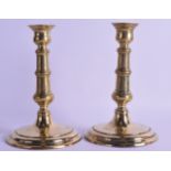 A PAIR OF 18TH CENTURY EUROPEAN BRASS CANDLESTICKS. 19.5 cm high.