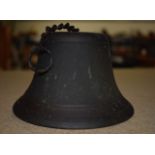 AN ANTIQUE HANGING BELL. 10 cm high.