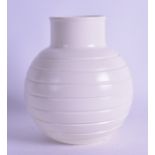 A STYLISH KEITH MURRAY WEDGWOOD BULBOUS VASE with ribbed body. 17.5 cm high.