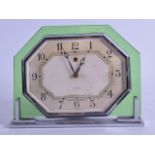 A STYLISH GREEN GLASS AND CHROME SMITH ELECTRIC MANTEL CLOCK. 18 cm wide.