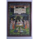 A LARGE 19TH CENTURY INDIAN FRAMED WATERCOLOUR ON SILK depicting buddhistic figures within