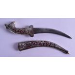 AN EARLY 20TH CENTURY ISLAMIC SILVERED DAGGER decorated with scrolling foliage. 24.5 cm long.