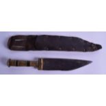 A 19TH CENTURY NORTH AFRICAN CARVED HORN HANDLED DAGGER with leather scabbard. 25 cm long.