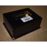A COLLECTION OF 24CT GOLD LAYERED PLAYING CARDS within a lacquered box.