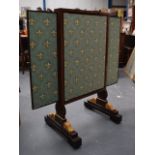 A LATE 19TH CENTURY ROSEWOOD DRESSING TABLE SCREEN with extending top, decorated with fleur de lys.