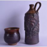 AN UNUSUAL STYLISH BROWN GLAZED STUDIO POTTERY JAR together with a similar stoneware ewer. 11 cm &