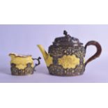 A 19TH CENTURY SILVER MOUNTED CROWN STAFFORDSHIRE TEAPOT AND COVER decorated with scrolling