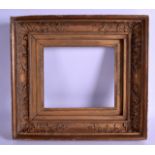 AN ANTIQUE CARVED GILTWOOD FRAME, together with a print etc. (4)