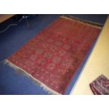 AN EASTERN BALUCH RUG together with another Turkish rug. 195 cm x 124 cm & 140 cm x 105 cm. (2)