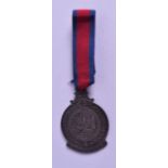 AN 1814 ROYAL BRISTOL VOLUNTEERS MEDAL decorated with the arms of Bristol. 3.5 cm wide.