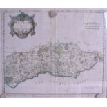 A FRAMED ANTIQUE MAP, depicting Sussex by Robert Morden. 36 cm x 43 cm.