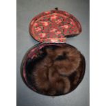 THREE ITEMS OF VINTAGE FUR CLOTHING in an associated hat box. (4)