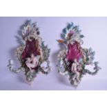 A GOOD LARGE PAIR OF 19TH CENTURY MEISSEN TWIN HANDLED PORCELAIN WALL BRACKETS modelled with figural