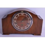 A 1950S SMITHS ENFIELD MANTEL CLOCK with openwork enamelled dial. 35 cm x 23 cm.