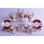 AN EARLY 20TH CENTURY VIENNA PORCELAIN COFFEE SET comprising of coffee pot, sugar basin, milk