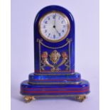 A GOOD RUSSIAN CARVED LAPIS LAZULI MANTEL CLOCK with enamelled dial, overlaid with classical