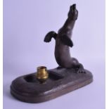 Louis Robert Calvin (C1920) A French bronze table lamp, in the form of a performing sea lion upon an