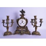 A MID 19TH CENTURY FRENCH GILT BRONZE CLOCK GARNITURE of scrolling acanthus capped form, with
