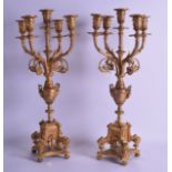 A PAIR OF LATE 19TH CENTURY FRENCH ORMOLU FIVE BRANCH CANDLEABRA modelled with scrolling acanthus