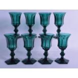 A SET OF EIGHT 18TH/19TH CENTURY GREEN GLASSES with hexagonal bases. 13.25 cm high. (8)
