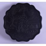 A CHINESE QING DYNASTY BLACK INKBLOCK the front decorated with a hare, the reverse decorated with
