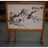 A CHINESE REPUBLICAN PERIOD MOUNTED SILKWORK TABLE decorated with birds.