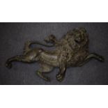 A GOOD LARGE ANTIQUE CAST IRON LION forming one part of a crest, with bracket. Lion 82 cm x 44 cm.