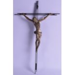 AN UNUSUAL 1950S CONTINENTAL BRASS CUBIST CRUCIFIX upon a metal cross. 55 cm x 34 cm.