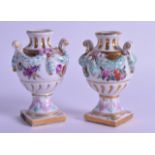 A PAIR OF LATE 19TH CENTURY MEISSEN STYLE PORCELAIN VASES painted with flowers, overlaid with blue