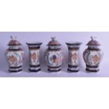 A 19TH CENTURY SAMSONS OF PARIS PORCELAIN CLOCK GARNITURE painted in the Chinese Export style with
